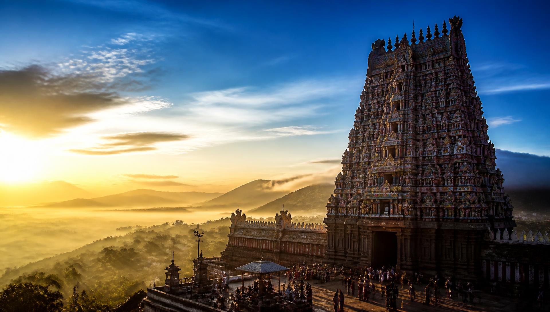 South Indian temple gopuram at sunrise, a popular devotional tour destination